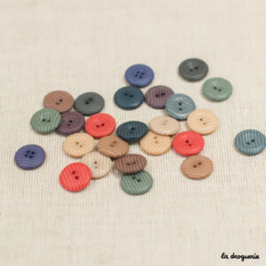 Bouton Grain de sable bord bombé 2 trous 15 mm